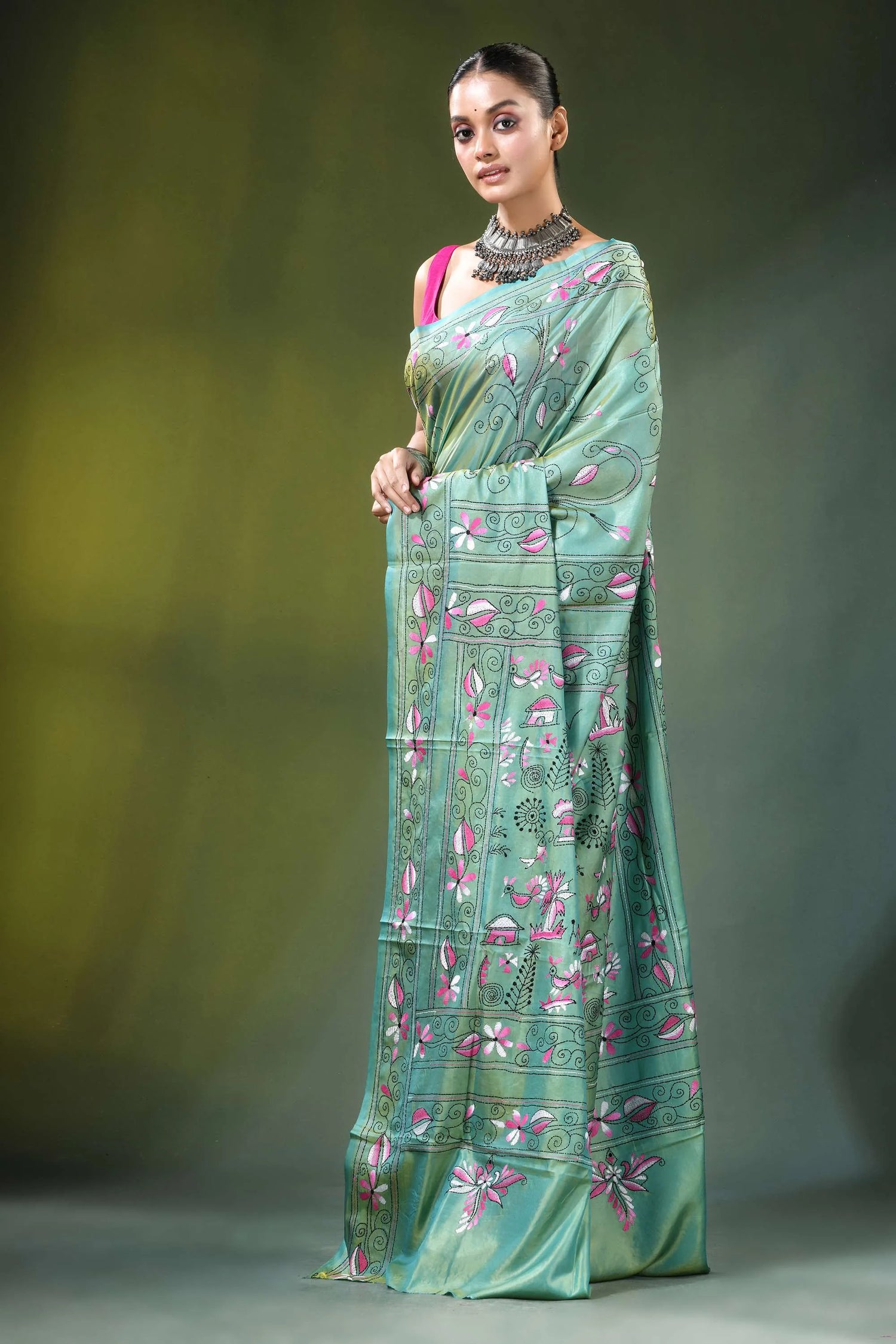 Handcrafted nature theme silk kantha stitch saree in sea green woman wears teal 3