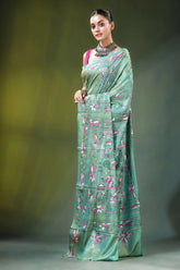 Handcrafted nature theme silk kantha stitch saree in sea green woman wears teal 3