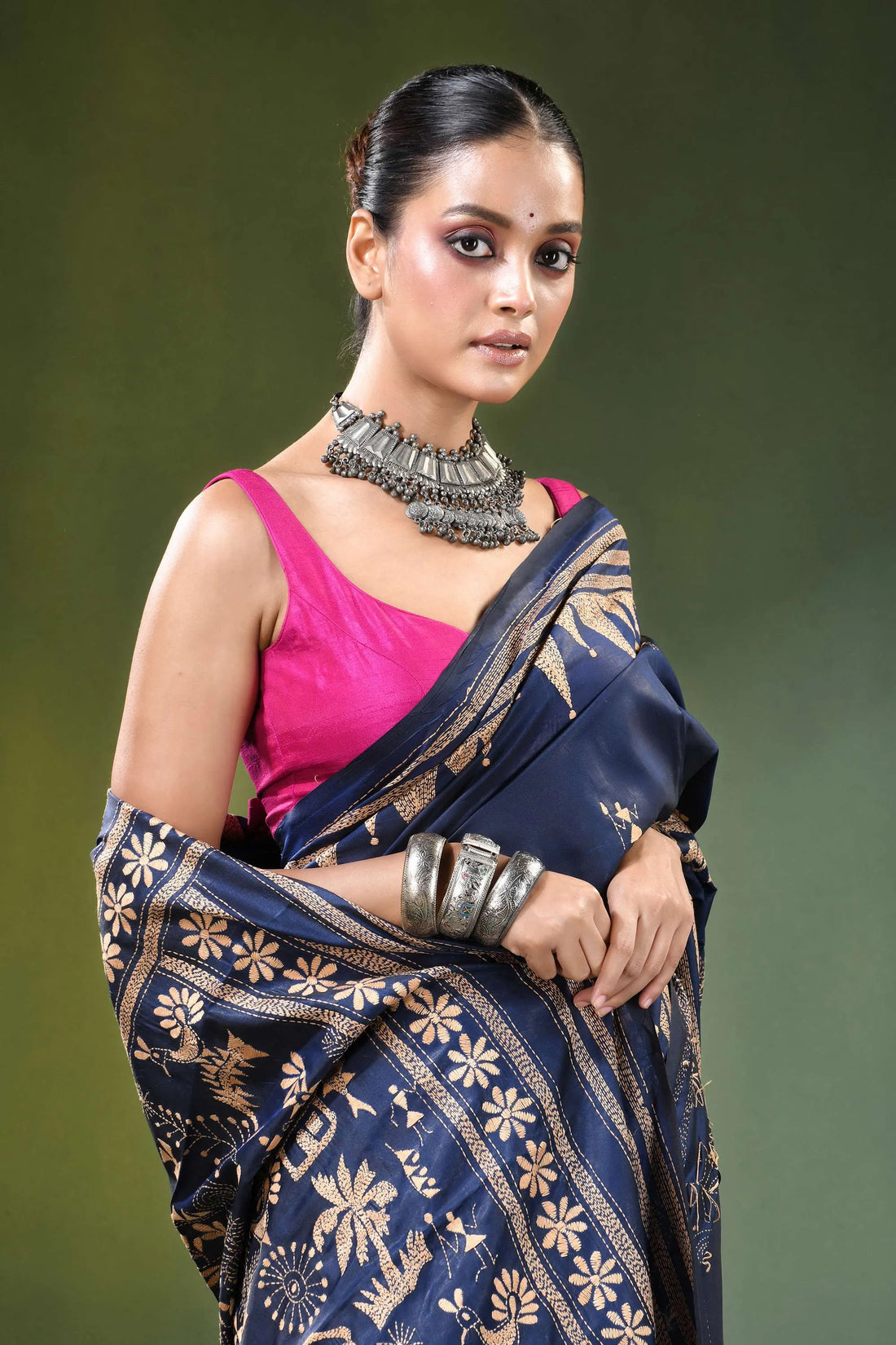 Handcrafted navy blue ethnic nature theme silk kantha work saree woman wears 2