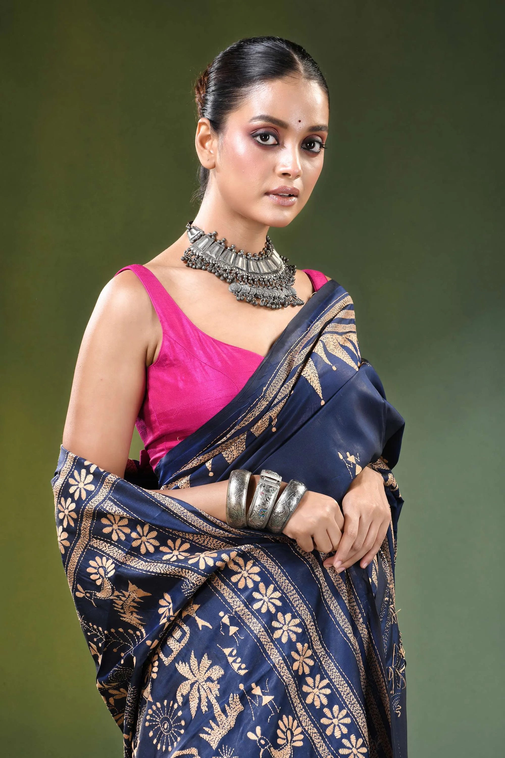 Handcrafted navy blue ethnic nature theme silk kantha work saree woman wears 2