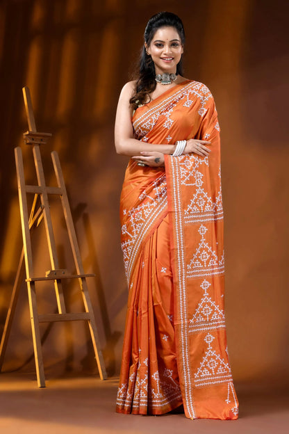 Handcrafted orange silk kutch work saree with geometric motif 1