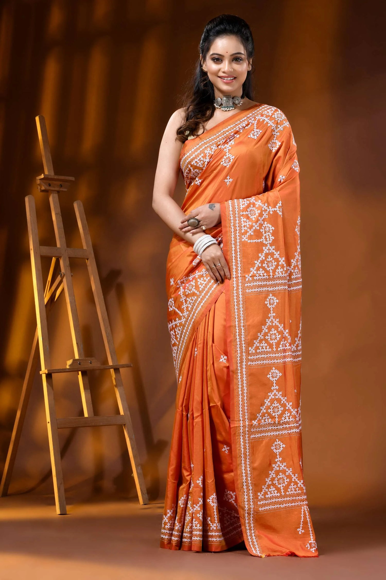 Handcrafted orange silk kutch work saree with geometric motif 6