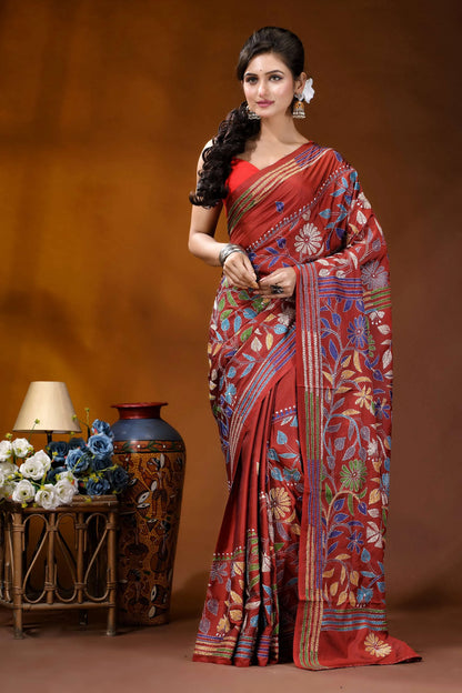 Handcrafted pale carmine silk kantha saree in multicolor floral motif woman wears rich red silk 2