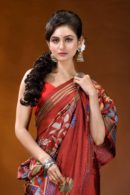 Handcrafted pale carmine silk kantha saree in multicolor floral motif woman wears vibrant red silk 5