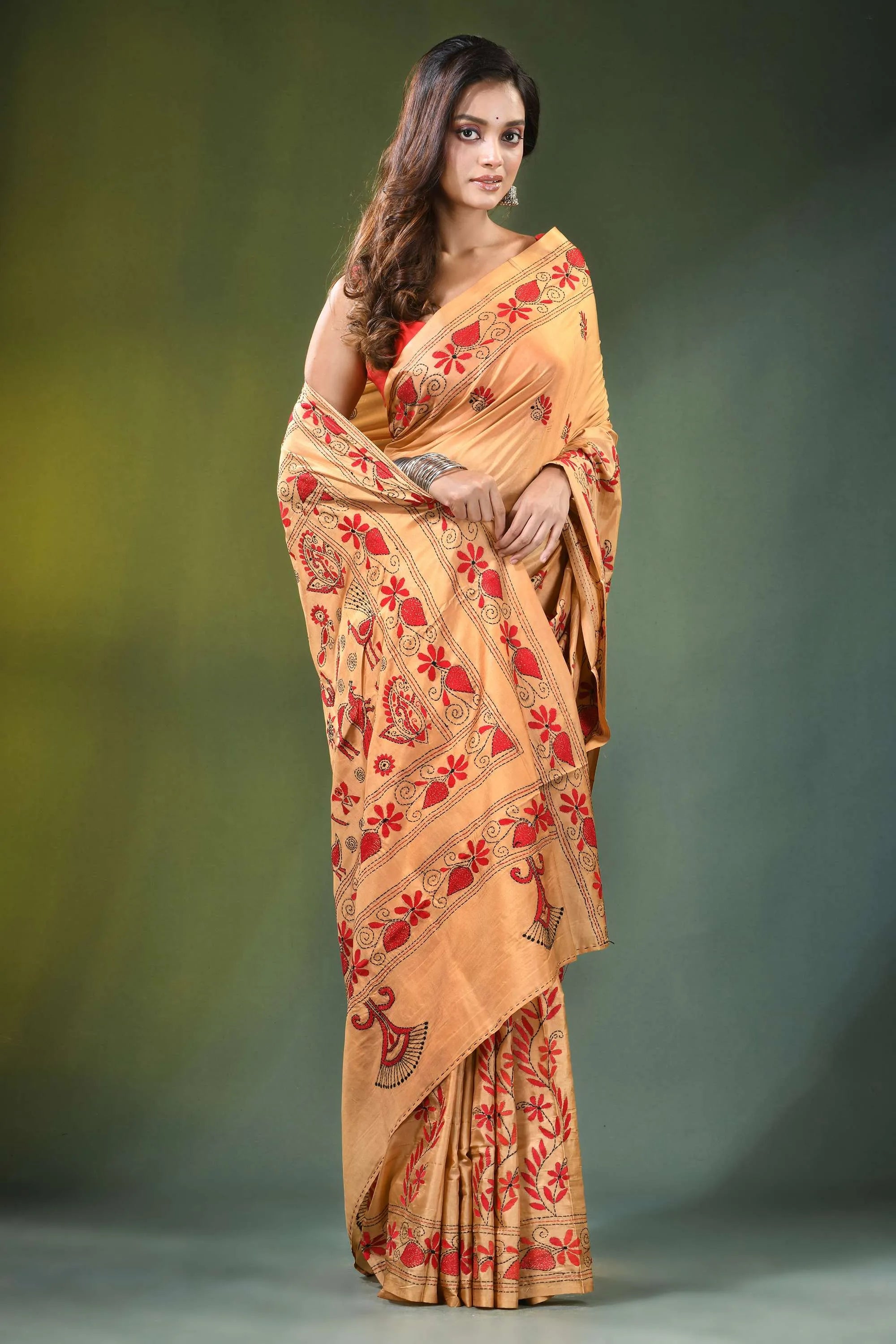 Handcrafted peach silk kantha saree with folk art peacocks design woman wears golden-yellow intricate 4