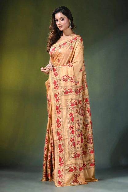 Handcrafted peach silk kantha saree with folk art peacocks design woman wears beige intricate 3