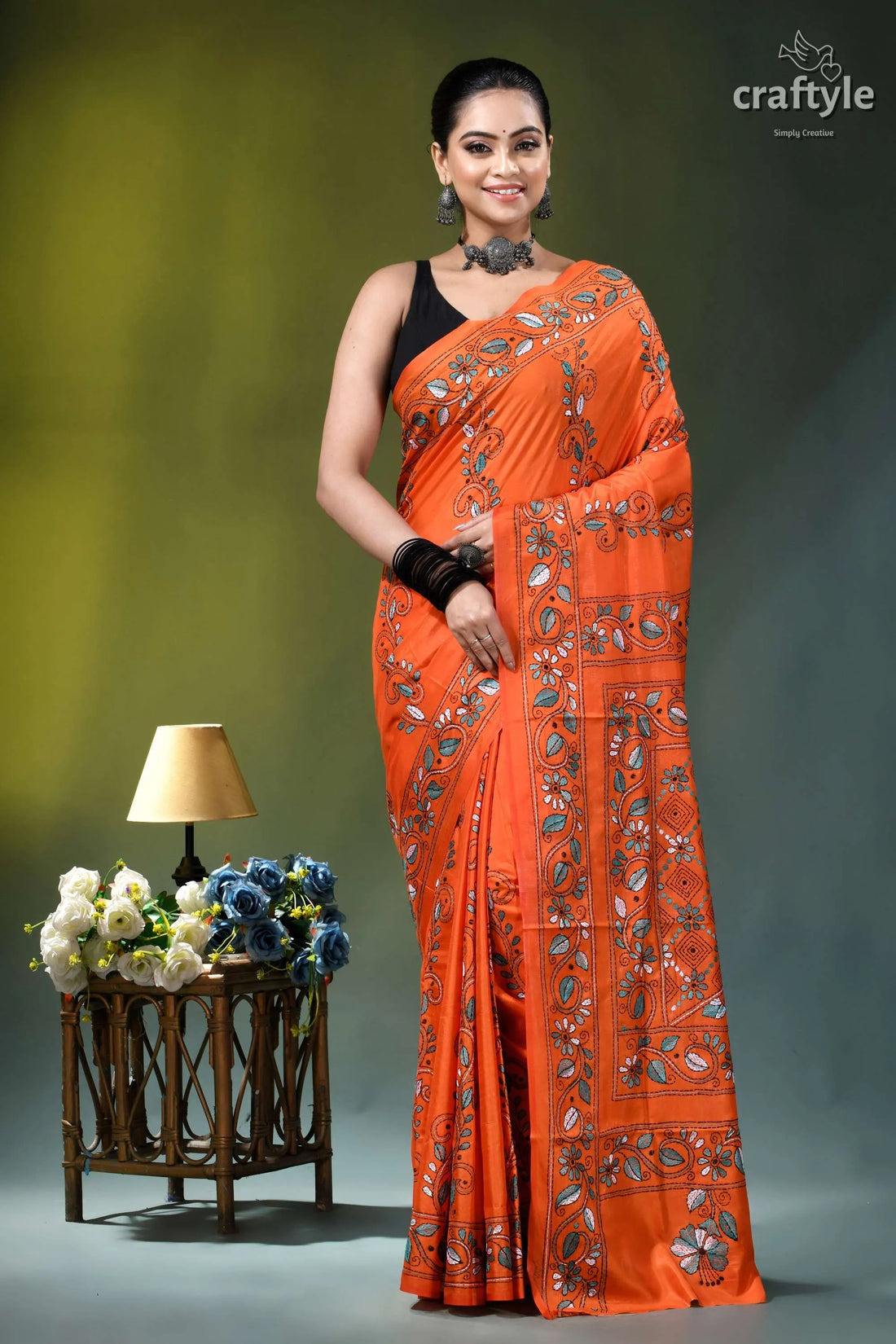 Handcrafted reddish orange floral design silk kantha saree vibrant orange saree intricate embroidered 1