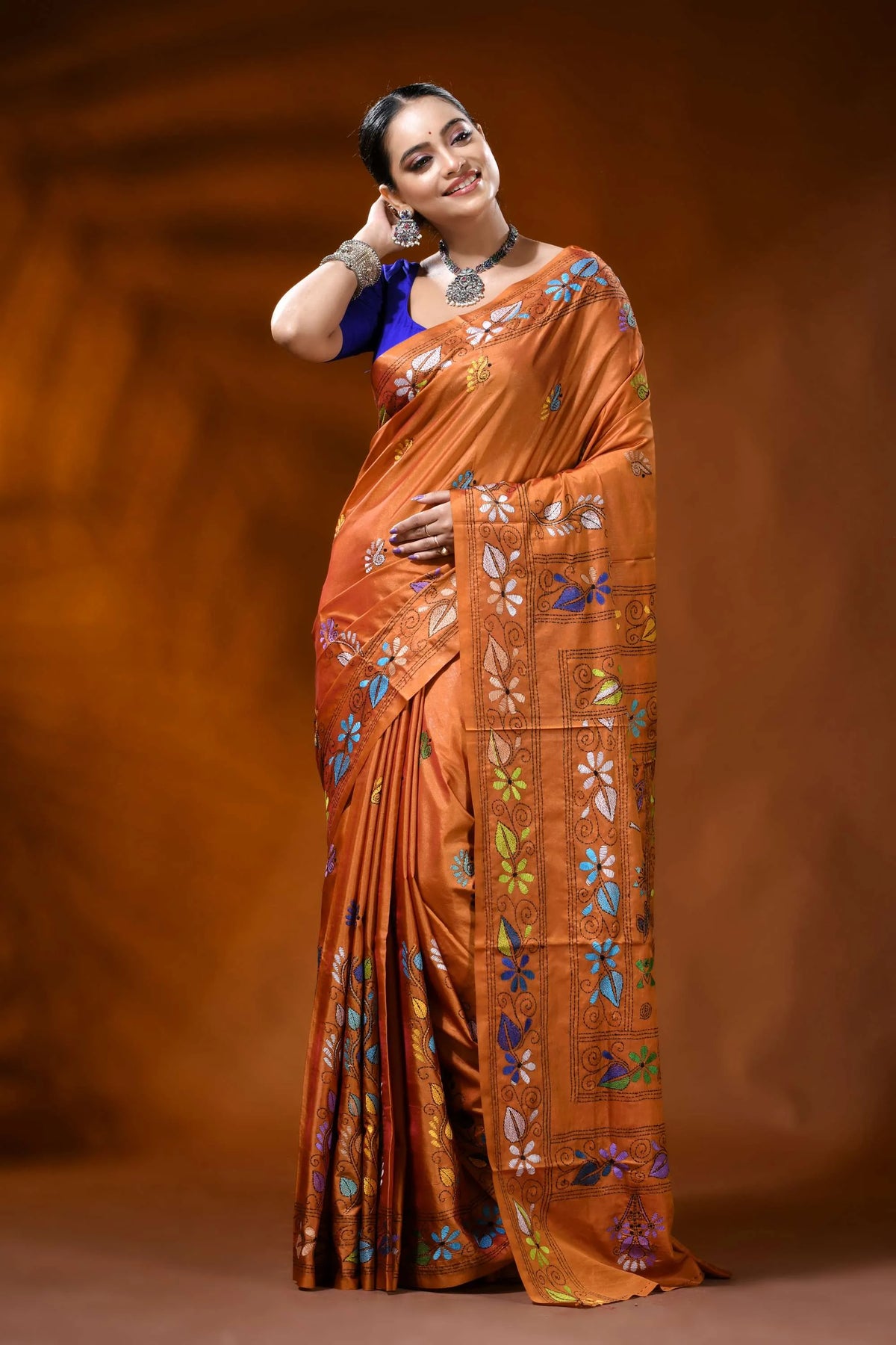 Handcrafted rust orange silk kantha saree with folk art motif 6
