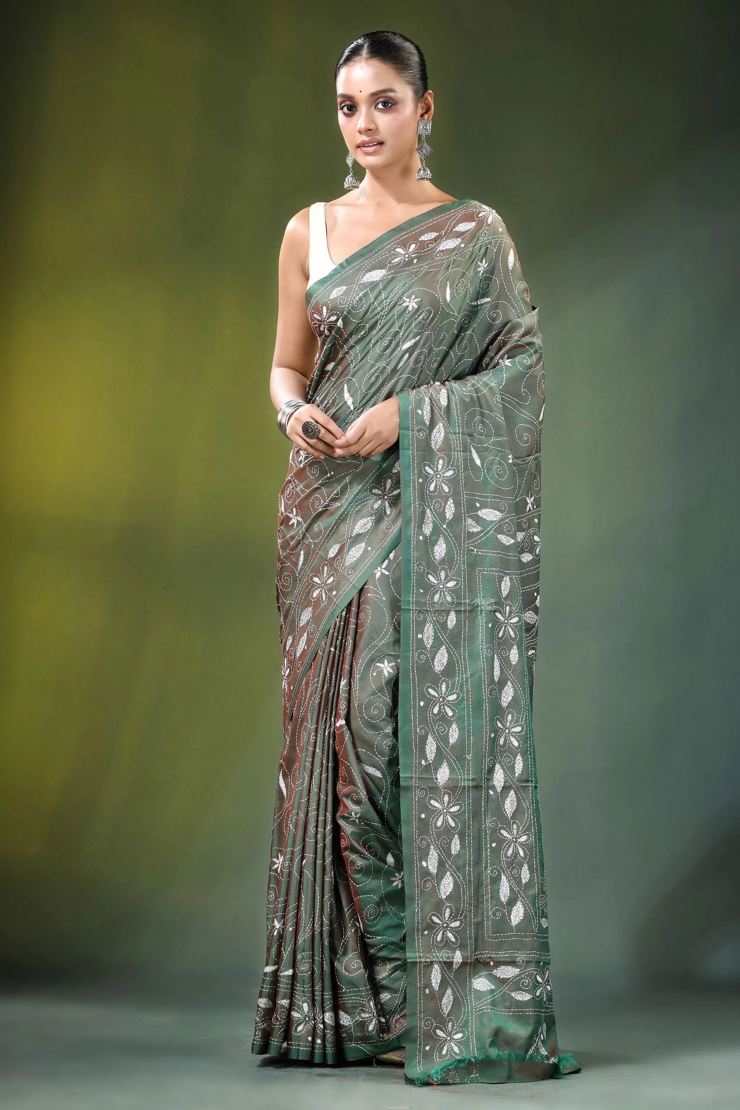 Handcrafted sage green nature theme silk kantha saree woman wears elegant olive-green 1
