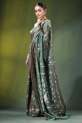 Handcrafted sage green nature theme silk kantha saree woman wears elegant emerald 4