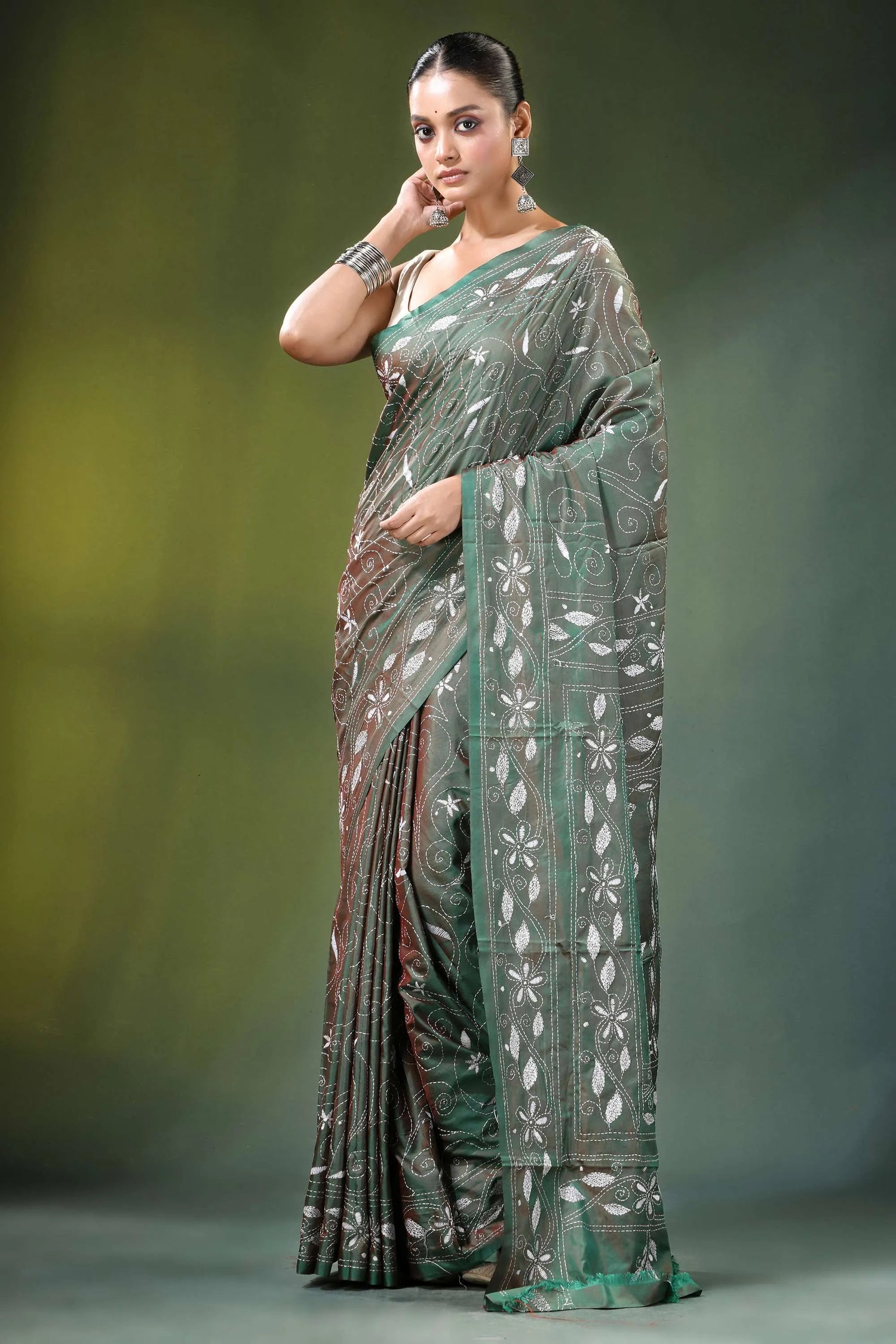 Handcrafted sage green nature theme silk kantha saree woman wears dark maroon 6