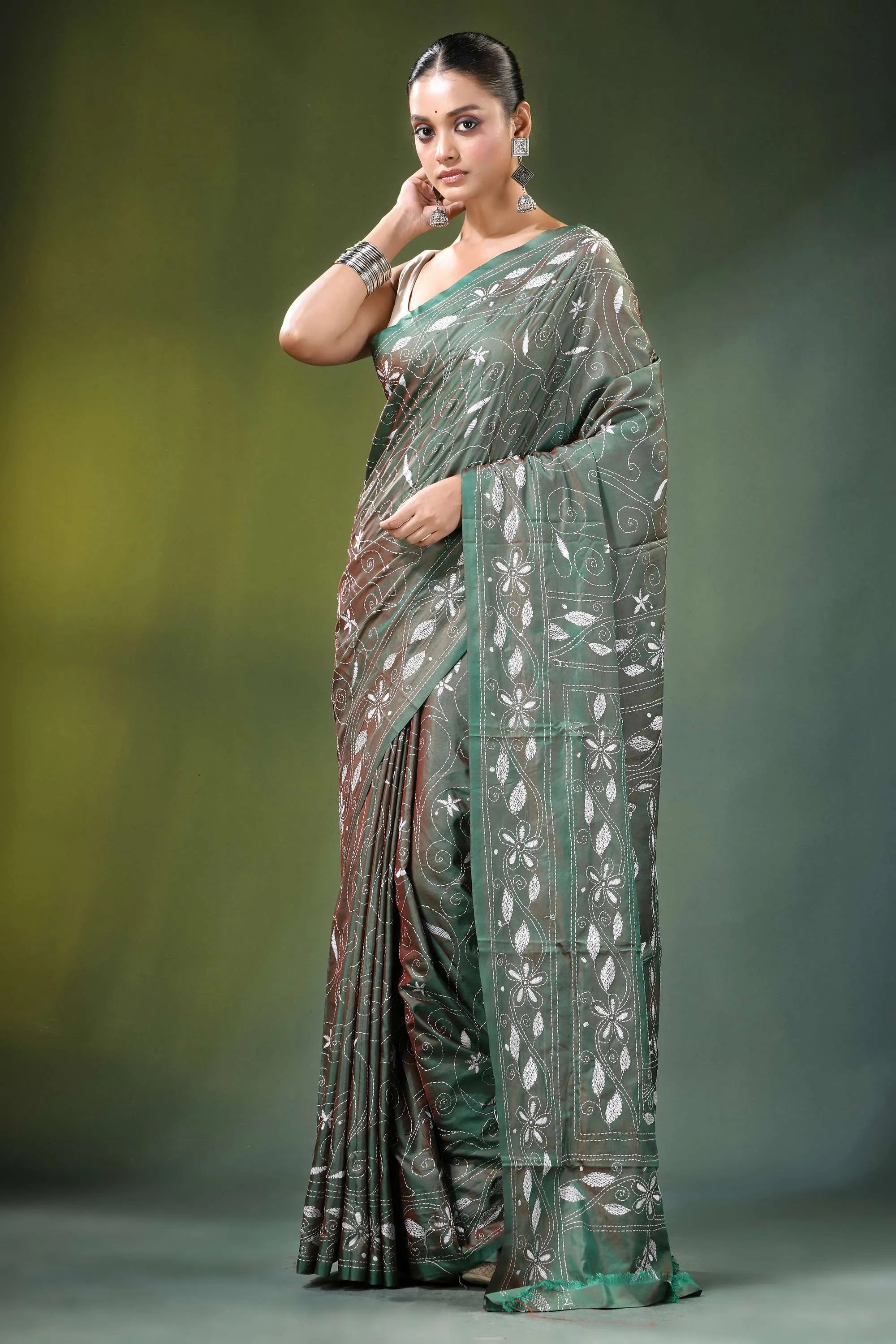 Handcrafted sage green nature theme silk kantha saree woman wears dark maroon 6