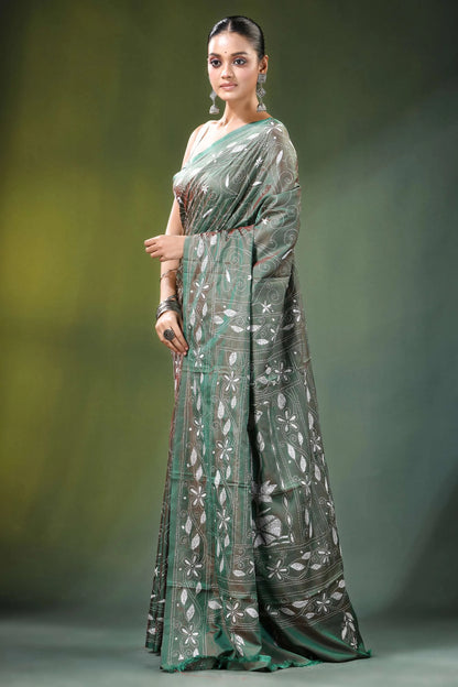 Handcrafted sage green nature theme silk kantha saree woman wears dark 3
