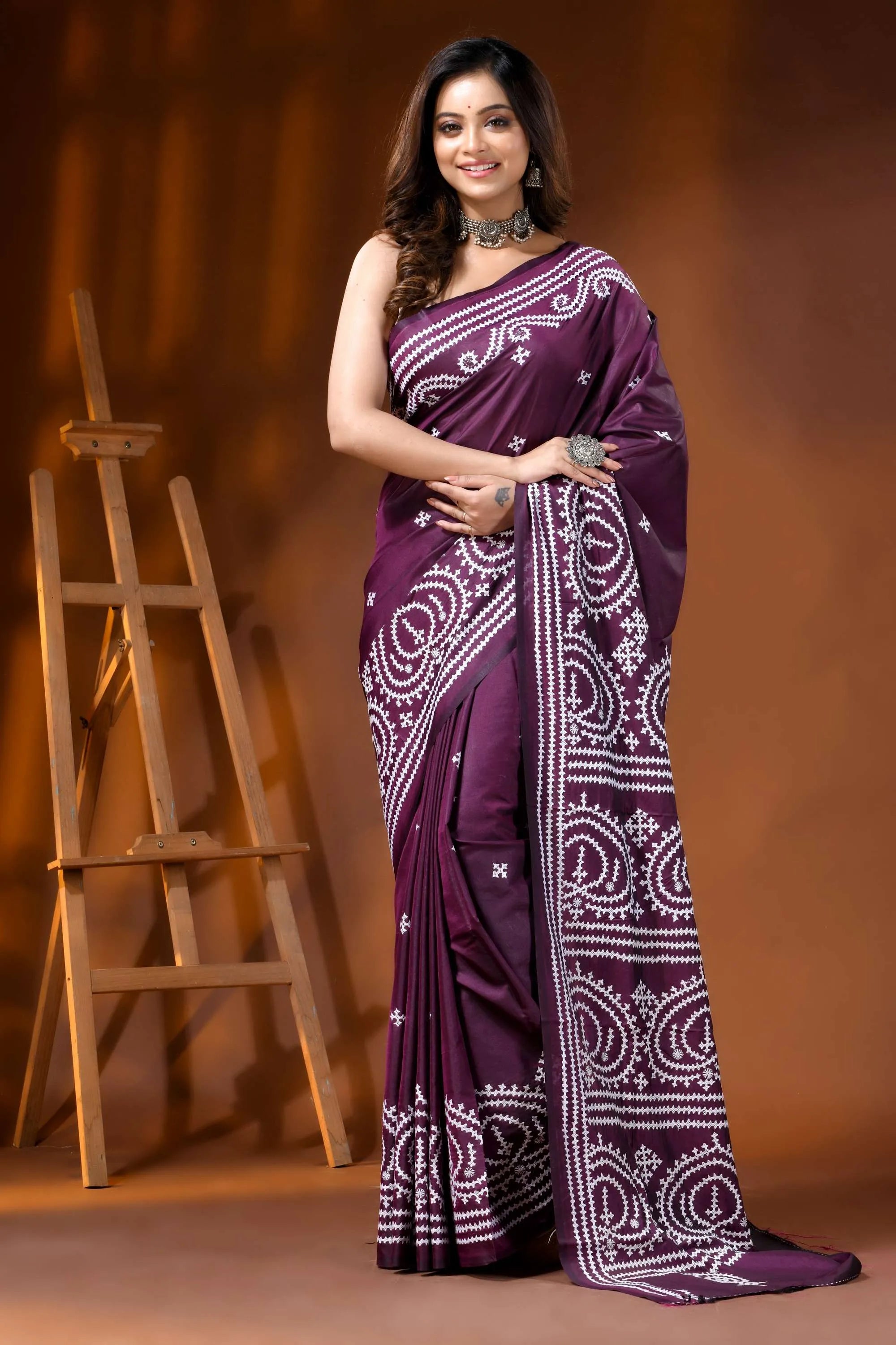 Handcrafted wine silk kutch work saree with paisley motif design 6