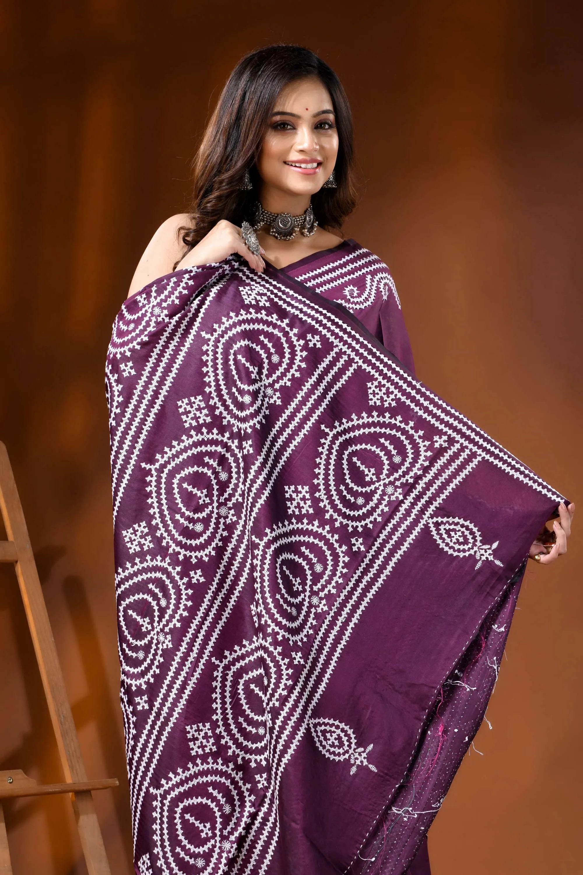 Handcrafted wine silk kutch work saree with paisley motif design 2