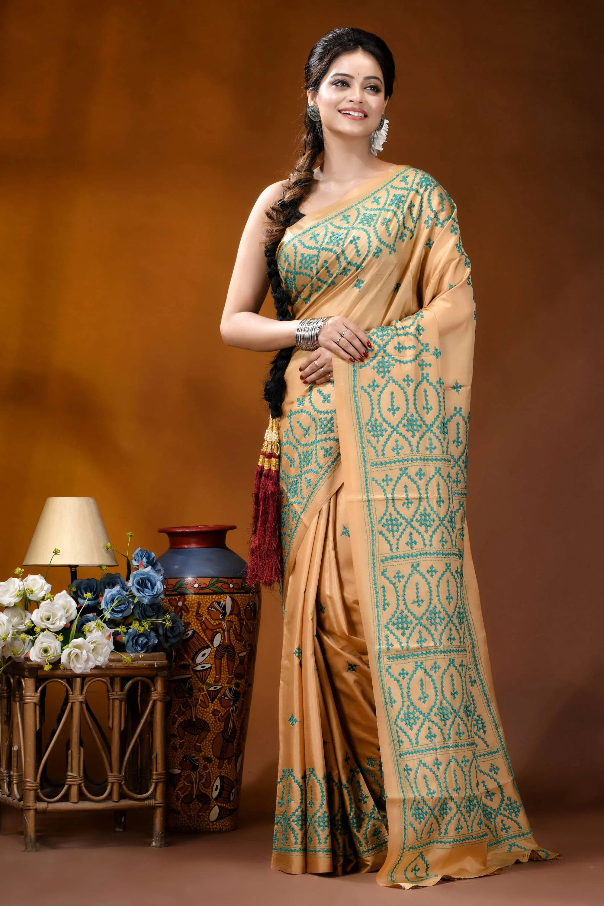 Handmade beige geometric design kutch embroidery silk saree woman wears beige silk saree 7