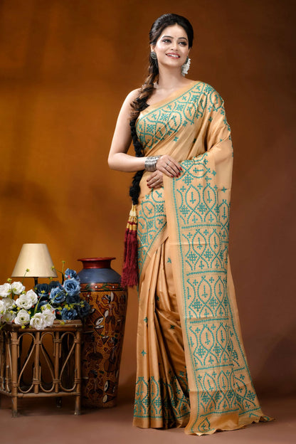 Handmade beige geometric design kutch embroidery silk saree woman wears beige silk saree 7