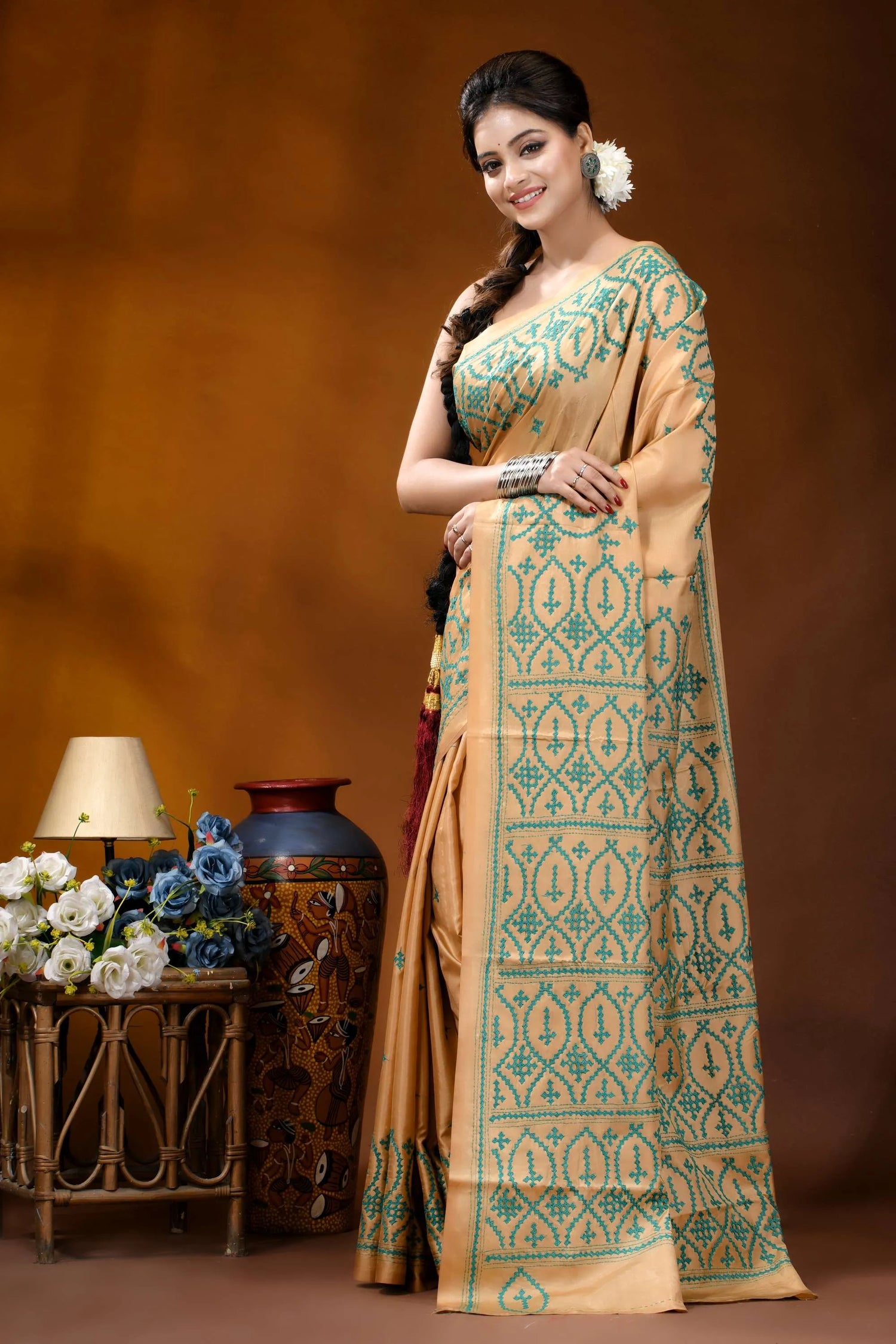 Handmade beige geometric design kutch embroidery silk saree woman wears beige saree intricate 3