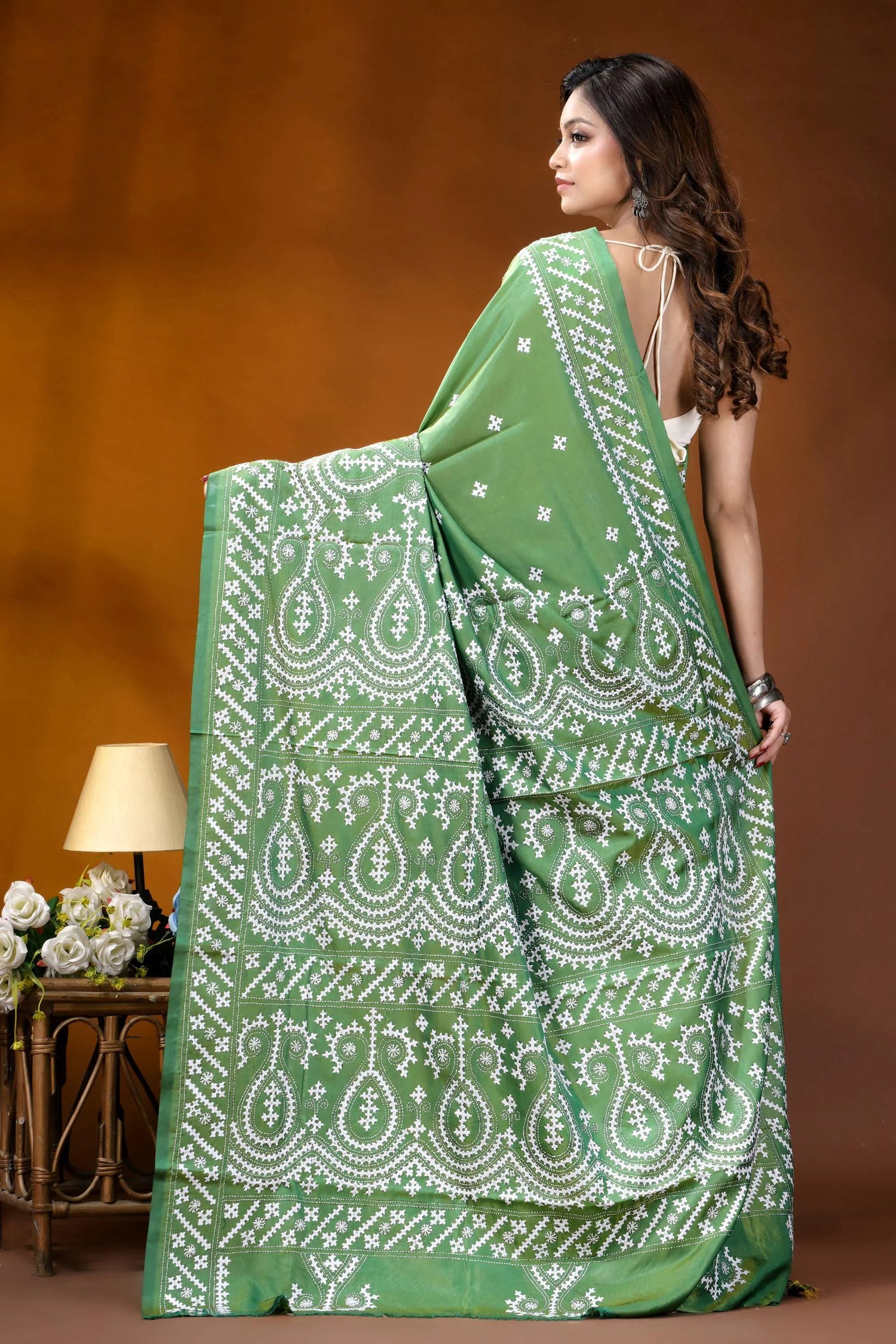 Handmade emerald green paisley design kutch work silk saree woman wears vibrant green saree 5