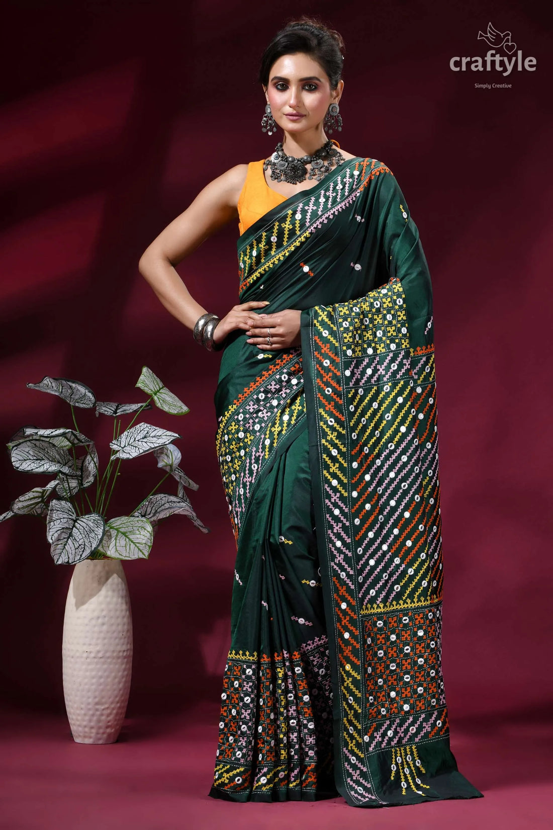 Intricate mirror work multicolor gujrati stitch silk saree in gable green dark green silk saree adorned 1