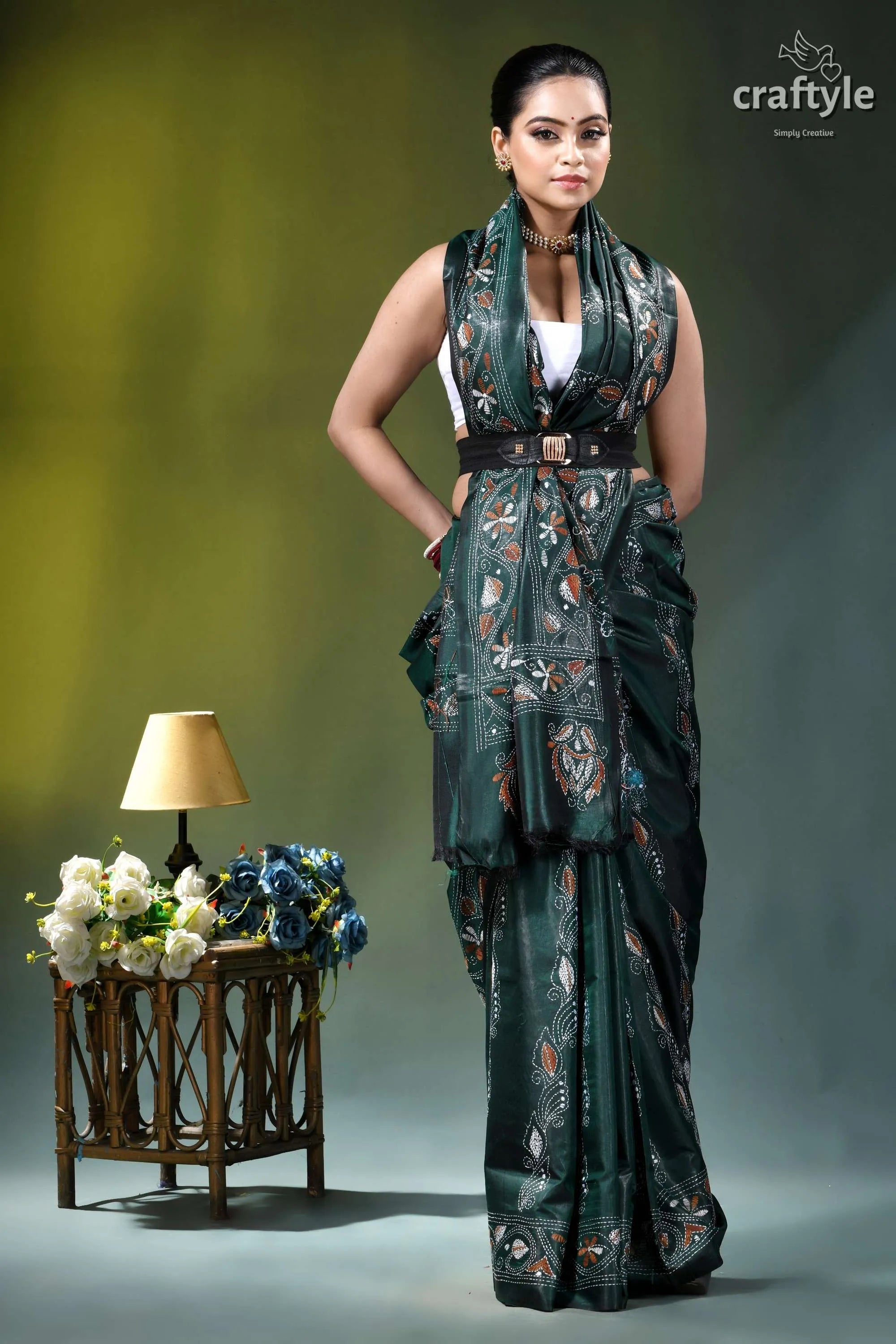 Jungle green elephant pattern silk kantha work saree woman wears dark green intricately 7