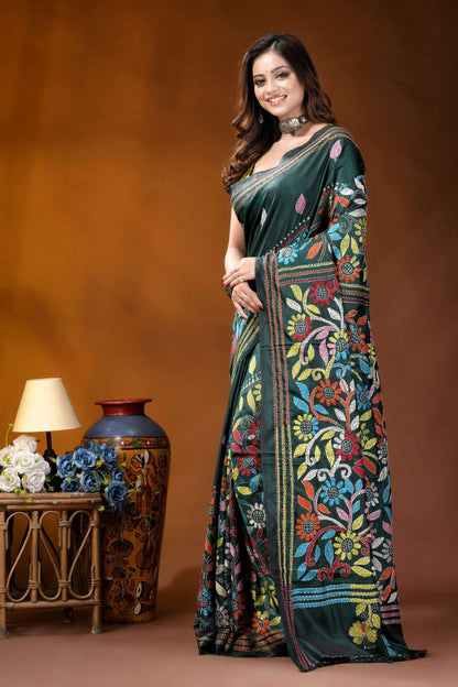 Jungle green multicolor floral hand embroidered kantha silk saree woman wears dark green silk 3