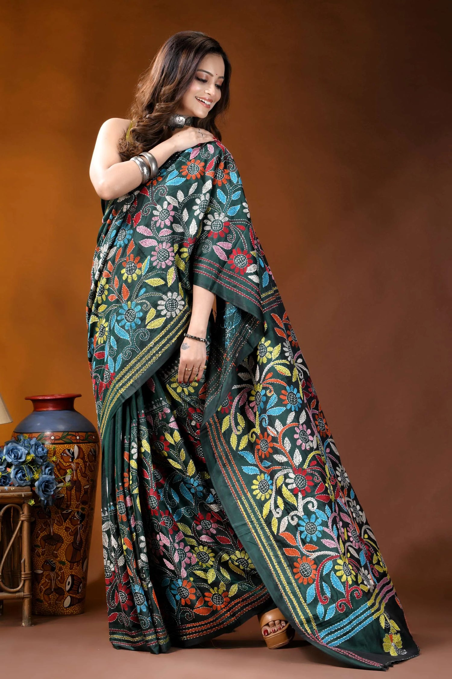 Jungle green multicolor floral hand embroidered kantha silk saree woman wears dark green saree 4