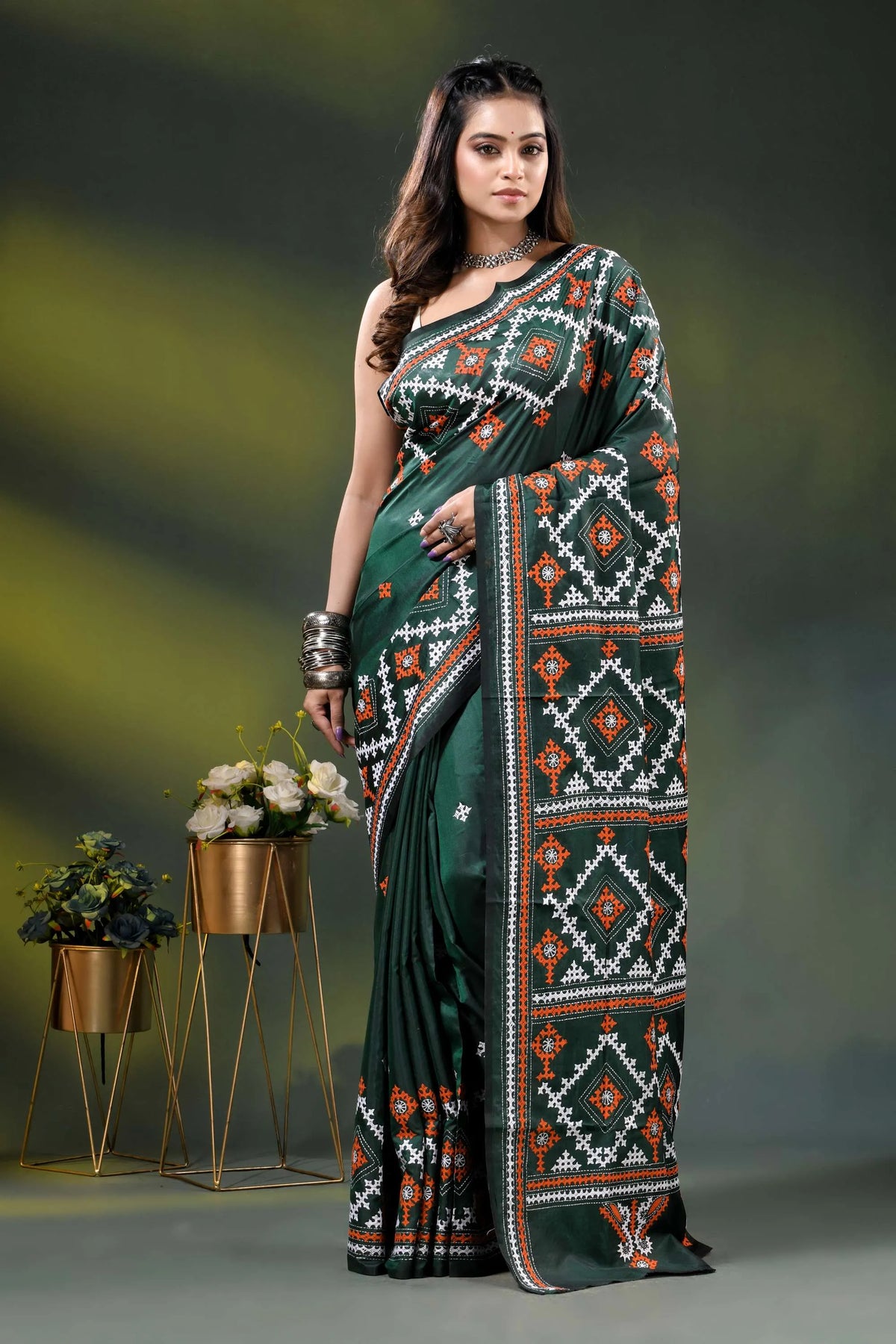 Jungle green silk gujrati stitch saree with geometric ethnic motif 1