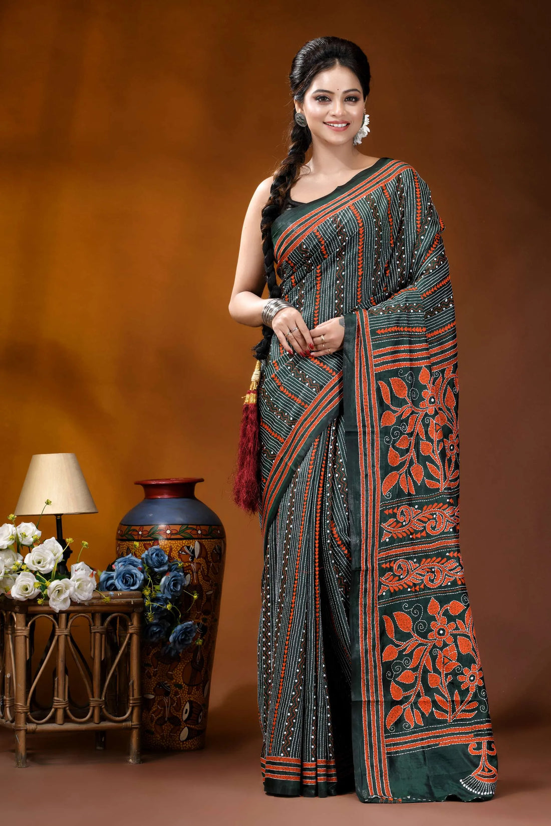 Jungle green silk kantha stitch saree with fiery orange thread floral motif dark green saree intricate orange 1