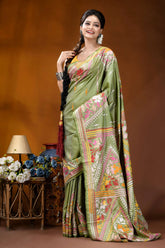 Leaf green floral design handcrafted kantha embroidery silk saree woman wears vibrant olive green 4
