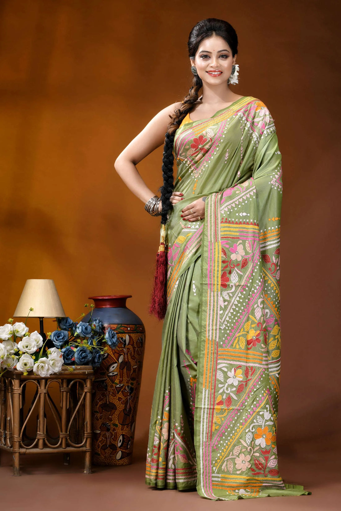 Leaf green floral design handcrafted kantha embroidery silk saree woman wears vibrant olive green 1