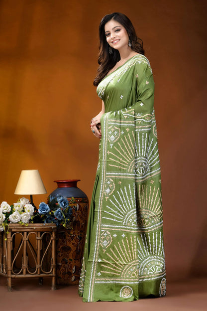 Leaf green multicolor design handmade kutch embroidery silk saree woman wears olive green saree 3