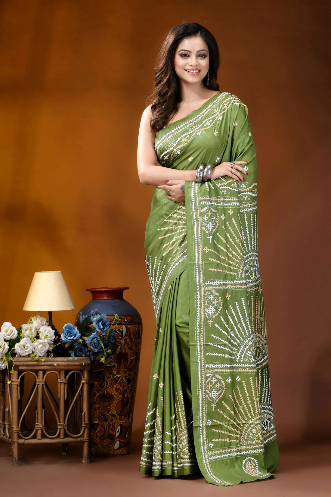 Leaf green multicolor design handmade kutch embroidery silk saree woman wears vibrant olive green 1