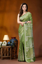 Leaf green multicolor design handmade kutch embroidery silk saree woman wears vibrant olive green 1