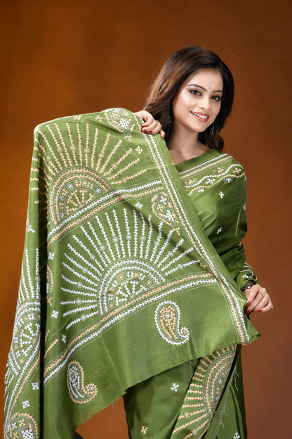 Leaf green multicolor design handmade kutch embroidery silk saree woman wears vibrant olive green 2