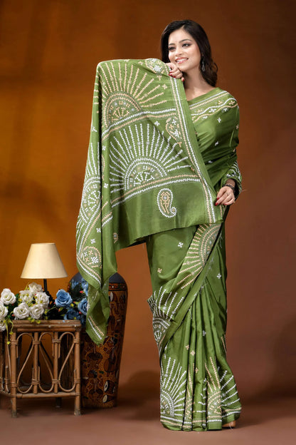Leaf green multicolor design handmade kutch embroidery silk saree woman wears vibrant olive green 6