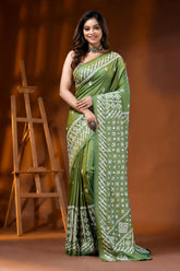 Leaf green silk kutch work saree with hand embroidered mirror detailing 6