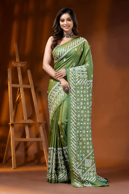 Leaf green silk kutch work saree with hand embroidered mirror detailing 6
