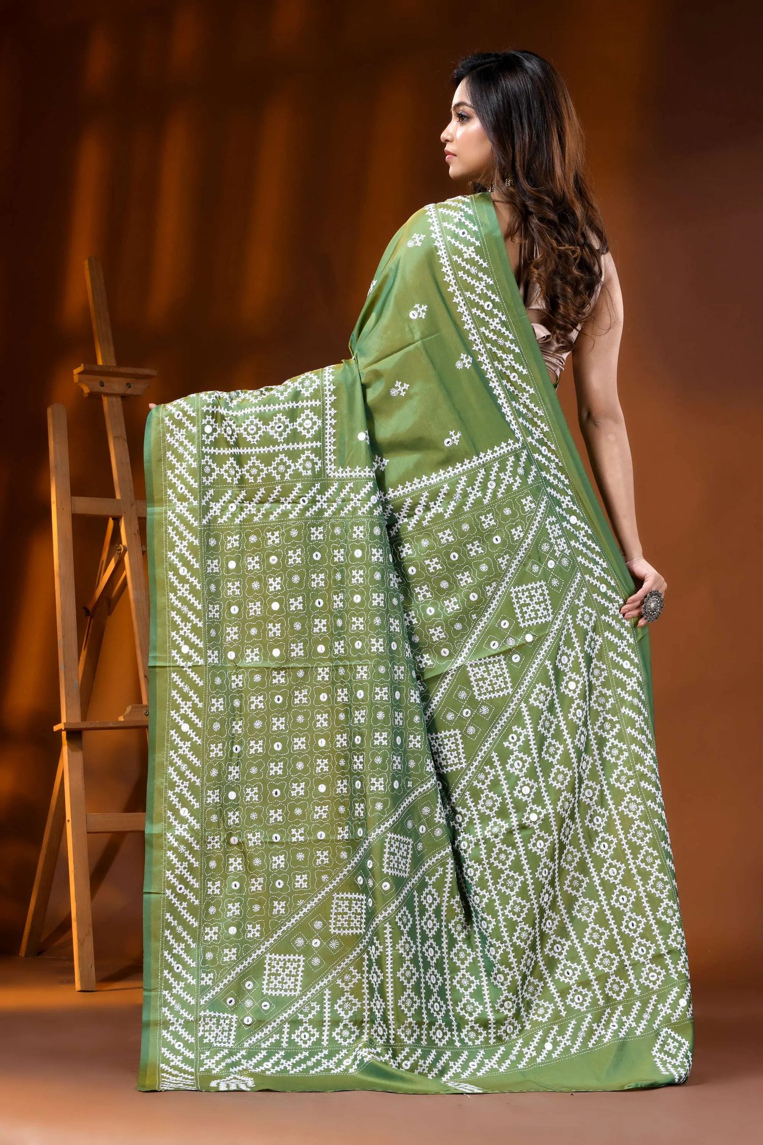 Leaf green silk kutch work saree with hand embroidered mirror detailing 5