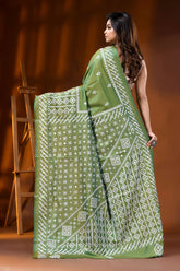 Leaf green silk kutch work saree with hand embroidered mirror detailing 5