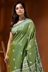 Leaf green silk kutch work saree with hand embroidered mirror detailing 2