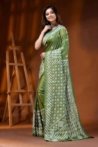 Leaf green silk kutch work saree with hand embroidered mirror detailing 3
