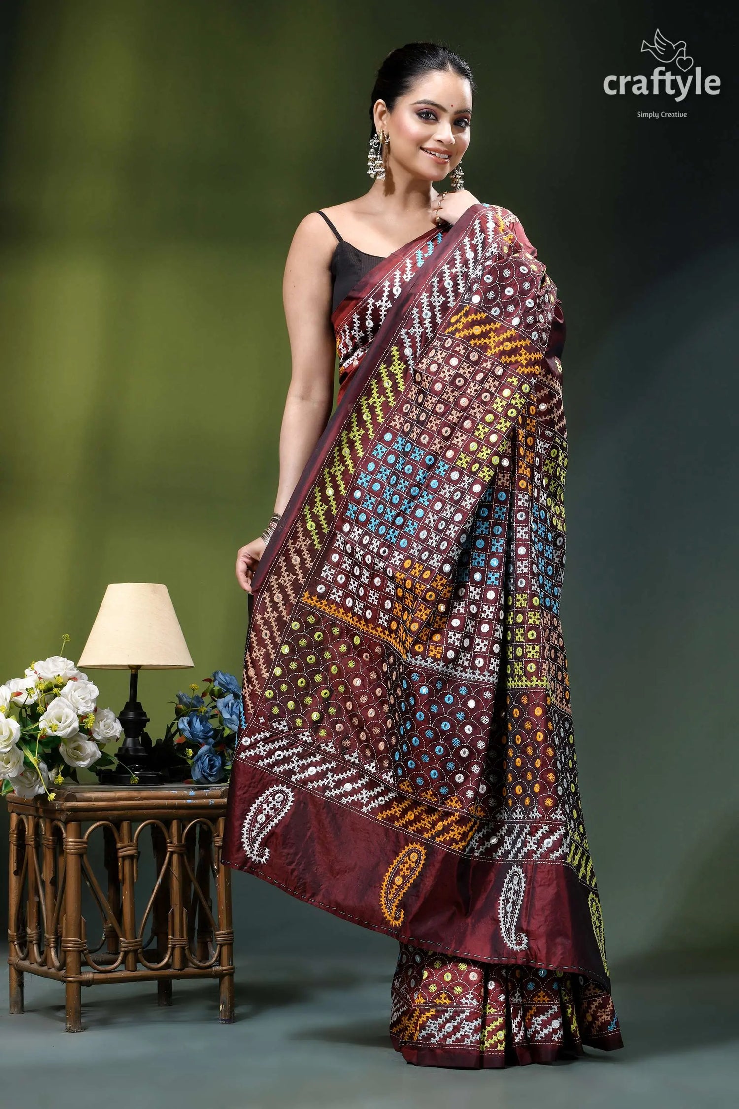 Livid brown multicolor gujrati stitched silk saree with mirror detailing maroon gold patterned saree intricate 5
