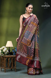 Livid brown multicolor gujrati stitched silk saree with mirror detailing maroon gold patterned saree intricate 5