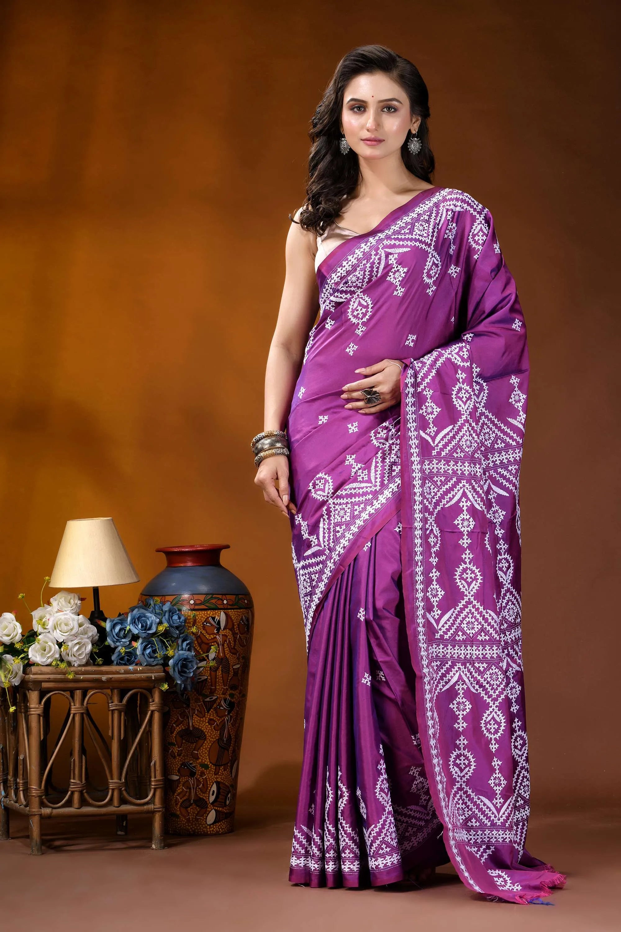 Magenta ethnic motif hand embroidery kutch silk saree vibrant purple saree intricate white 1