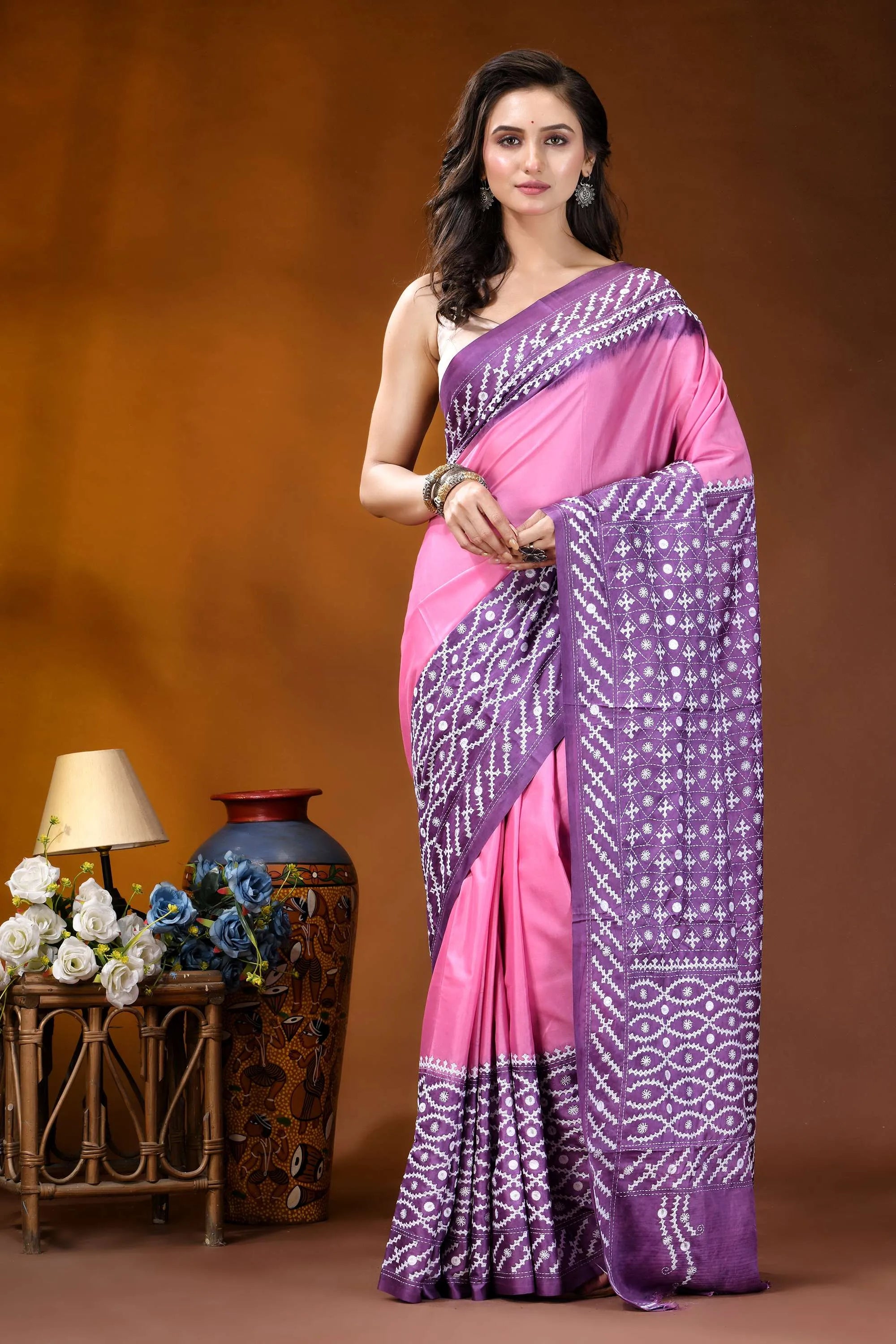 Magenta pink ethnic design kutch embroidered dyed silk saree with mirror work woman wears vibrant pink purple 1