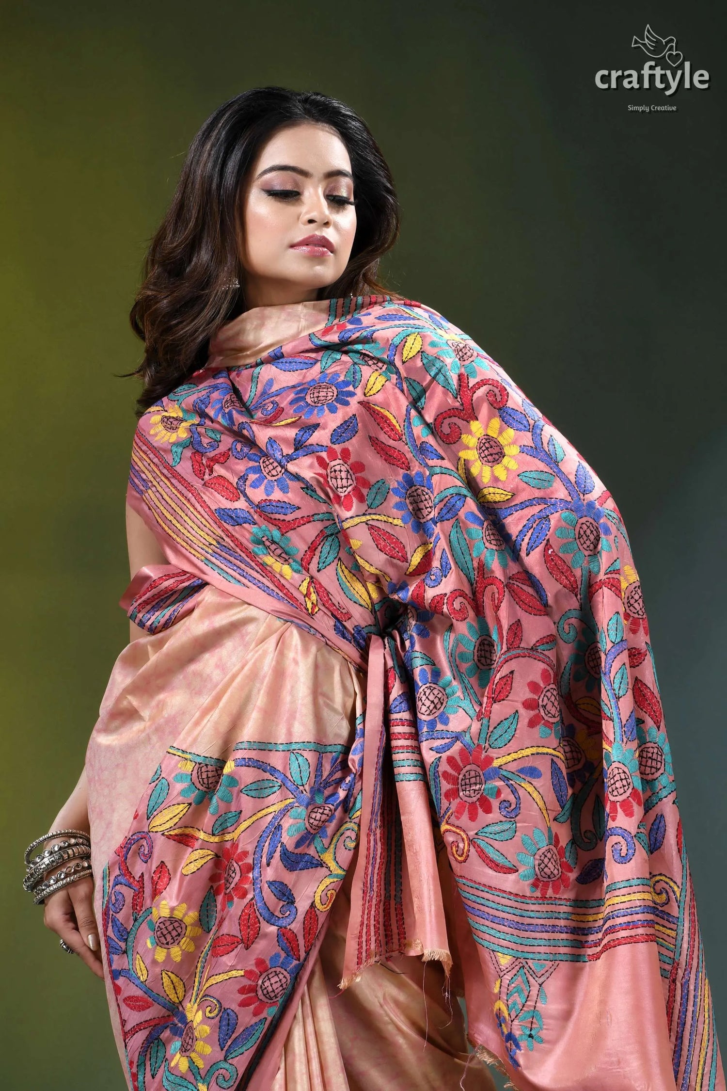 Mandys pink floral design hand kantha stitch batik silk saree woman wears peach-colored silk saree 5