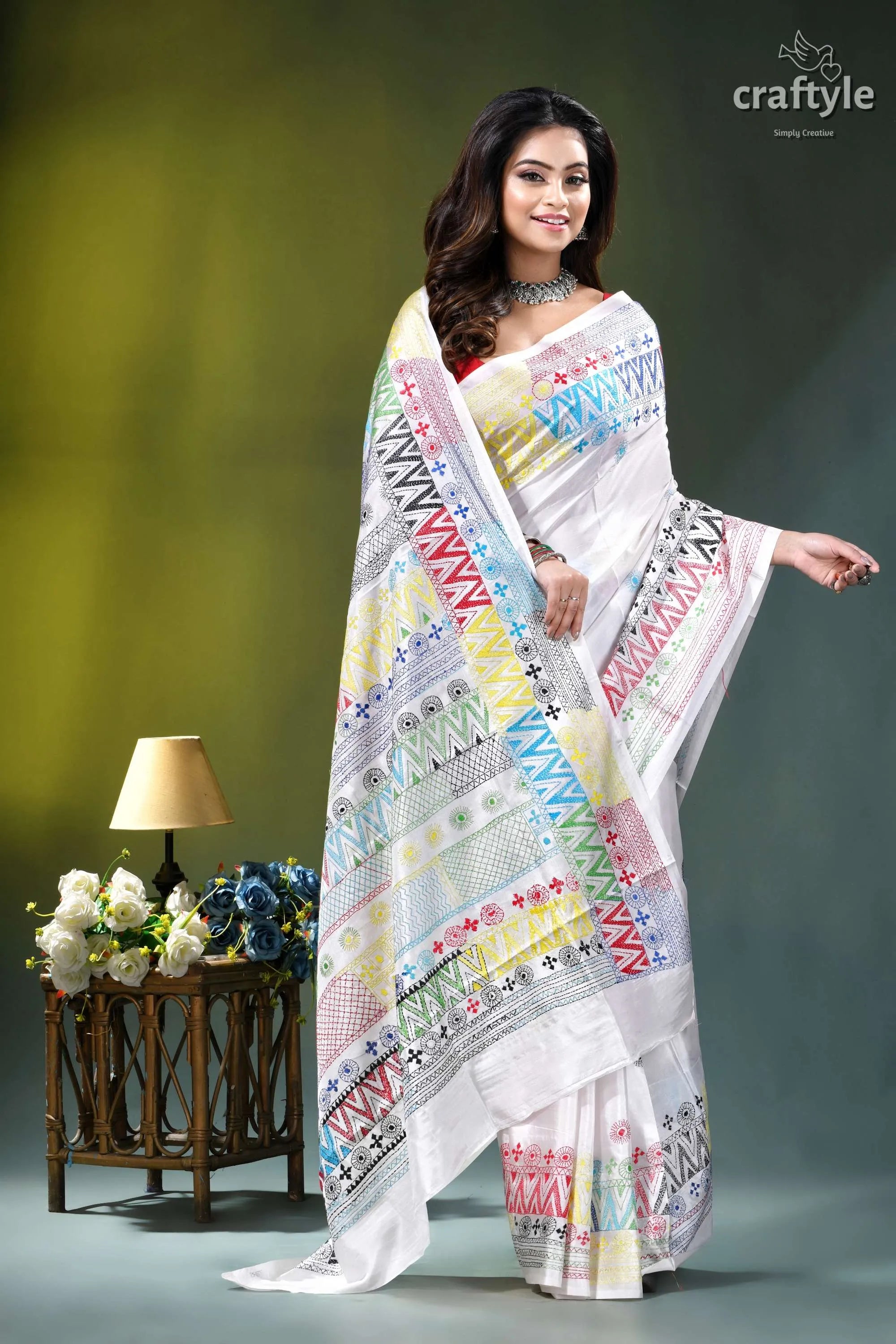 Milk white multithread geometric pattern silk lambani embroidery saree white saree adorned vibrant geometric 4