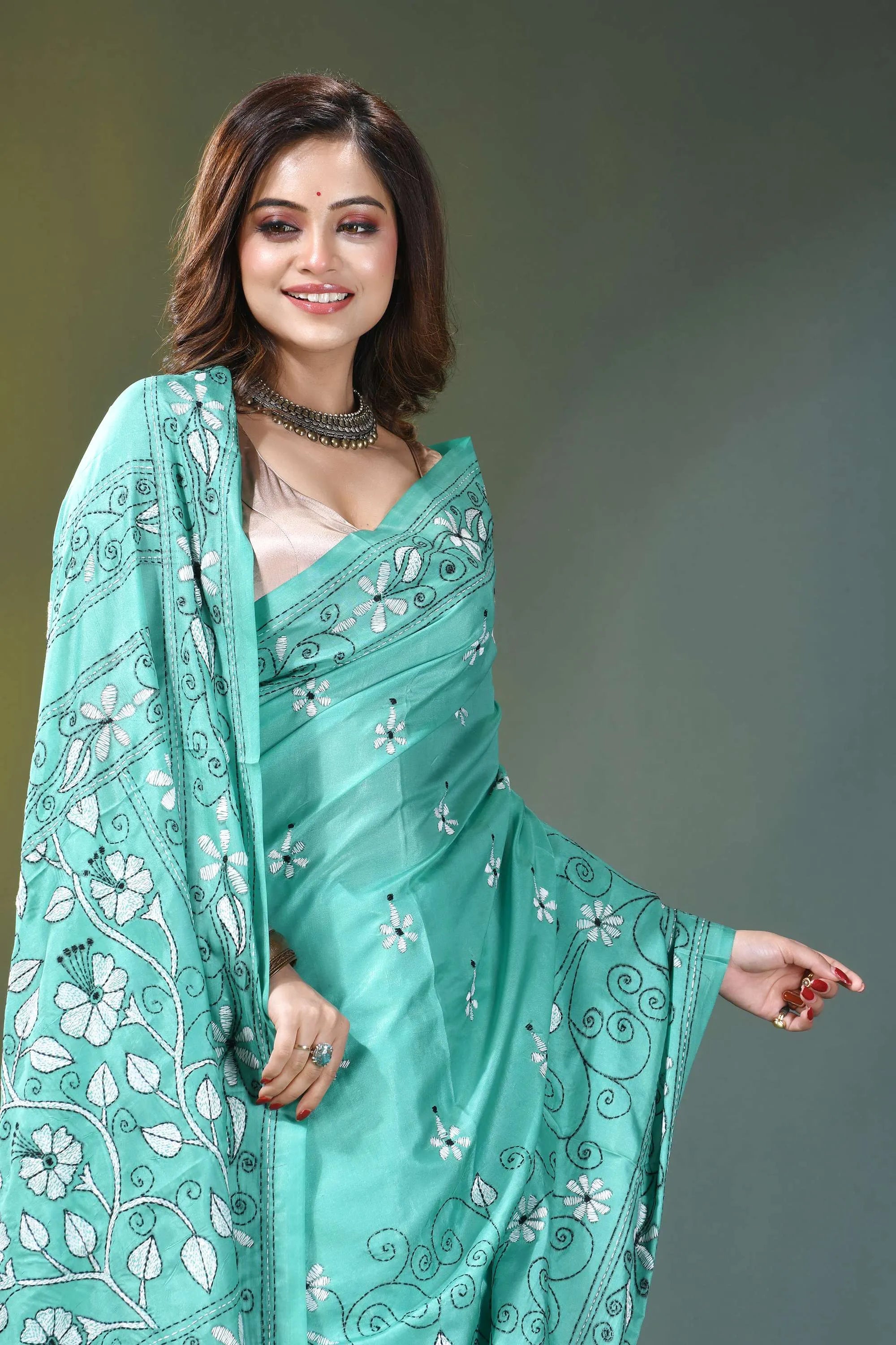 Mint green floral design hand embroidery kantha silk saree woman wears teal silk saree 6