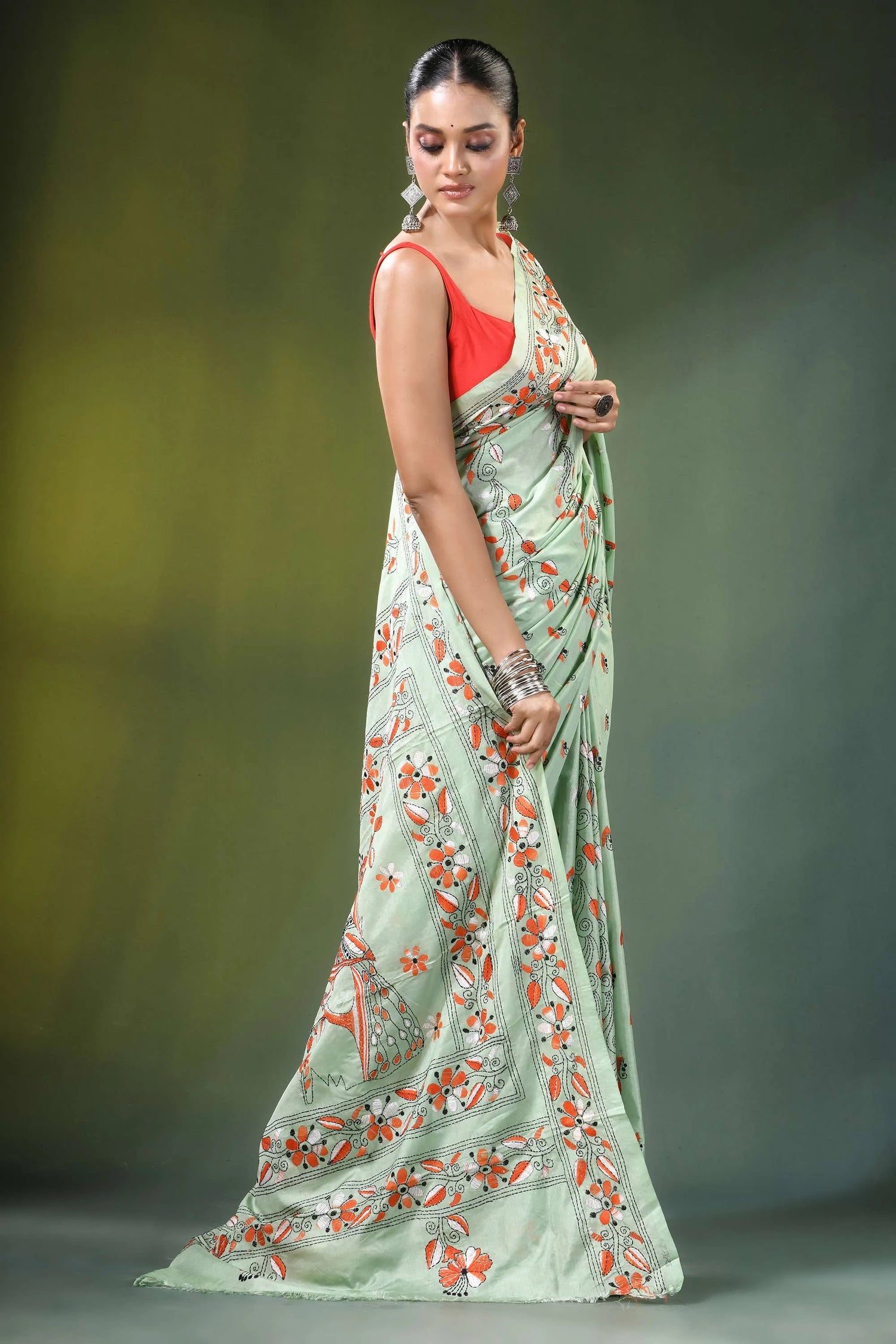Mint green peacock motif handmade silk kantha saree woman wears light 5
